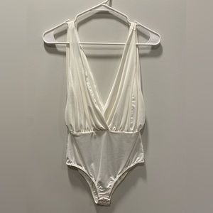 Woman’s all white bodysuit